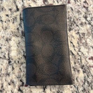 Brown and black Coach wallet.